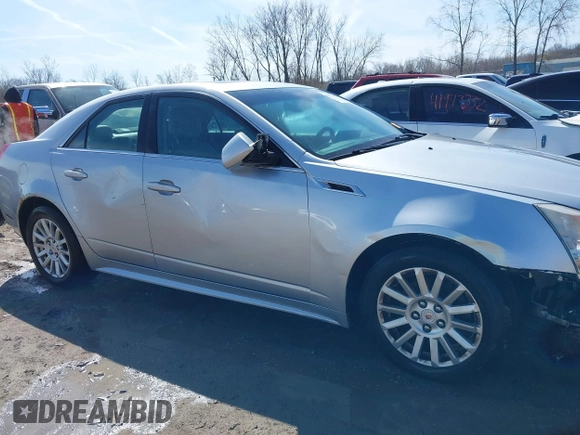 2013 Cadillac CTS Luxury z VIN 1G6DG5E56D0112860, wystawiony jako IAAI lot #41970874 z przebiegiem 125 647 mil mil oraz . Historia ofert i sprzedaży dostępna na DreamBid. Obrazek 13.