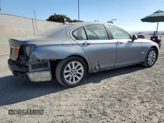 2014 BMW 7 Series 740i with VIN WBAYA6C55ED144487, listed as a Copart auction lot 77044014 with 86,149 mi miles and Salvage Title. Bid and sale history available at carsss.com. Image 3.