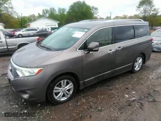 2014 Nissan Quest S with VIN JN8AE2KP1E9104483, listed as a IAAI auction lot 41982871 with 224,781 mi miles. Bid and sale history available at carsss.com. Image 2.