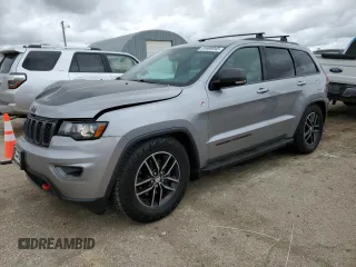 2018 Jeep Grand Cherokee Trailhawk with VIN 1C4RJFLG8JC164774, listed as a Copart auction lot 51699845 with 104,467 mi miles and Salvage title. Bid and sale history available at DreamBid. Image 1.