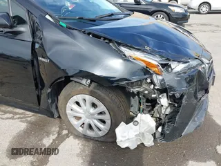 2022 Toyota Prius L Eco with VIN JTDKAMFU2N3157283, listed as a IAAI auction lot 41620334 with 59,754 mi miles. Bid and sale history available at carsss.com. Image 6.