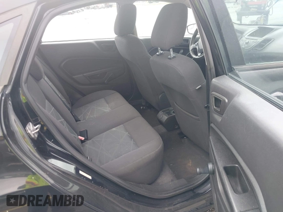 2014 Ford Fiesta S z VIN 3FADP4AJ9EM104704, wystawiony jako IAAI lot #42016647 z przebiegiem 81 826 mil mil oraz . Historia ofert i sprzedaży dostępna na DreamBid. Obrazek 8.