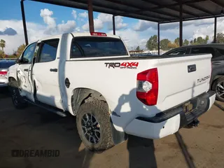 2018 Toyota Tundra SR5 z VIN 5TFDW5F16JX776543, wystawiony jako IAAI lot #40874026 z przebiegiem 59 636 mil mil oraz . Historia ofert i sprzedaży dostępna na DreamBid. Obrazek 3.