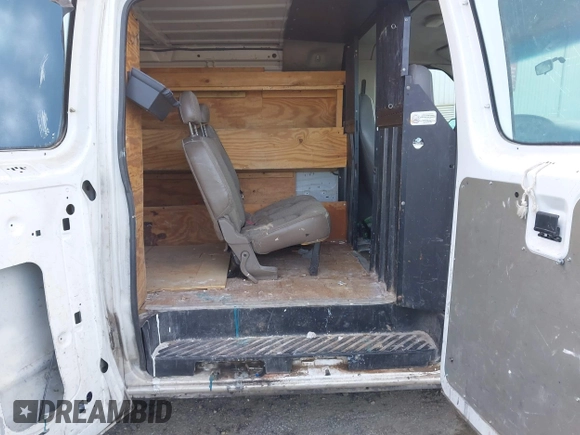 2003 Ford Econoline Cargo with VIN 1FTRE14263HA39384, listed as a IAAI auction lot 41267380 with 317,767 mi miles and . Bid and sale history available at DreamBid. Image 8.