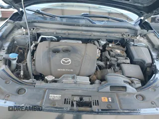 2020 Mazda CX-5 Grand Touring z VIN JM3KFADMXL0740144, wystawiony jako IAAI lot #41830203 z przebiegiem 70 535 mil mil oraz . Historia ofert i sprzedaży dostępna na DreamBid. Obrazek 10.