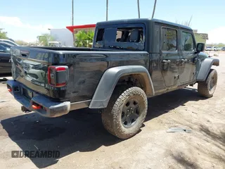 2022 Jeep Gladiator Mojave with VIN 1C6JJTEGXNL177175, listed as a IAAI auction lot 42652508 with Not provided miles and . Bid and sale history available at DreamBid. Image 4.