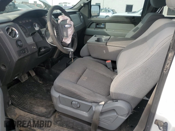 2012 Ford F-150 XL with VIN 1FTFW1EF0CFA48871, listed as a Copart auction lot 51699325 with 187,283 mi miles and Salvage title. Bid and sale history available at DreamBid. Image 7.