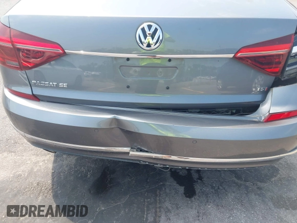 2017 Volkswagen Passat SE with VIN 1VWGT7A33HC058764, listed as a IAAI auction lot 42668036 with 76,732 mi miles and . Bid and sale history available at DreamBid. Image 18.