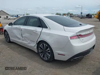 2019 Lincoln MKZ Hybrid Reserve II z VIN 3LN6L5MUXKR632126, wystawiony jako IAAI lot #42186526 z przebiegiem 130 364 mil mil oraz . Historia ofert i sprzedaży dostępna na DreamBid. Obrazek 3.
