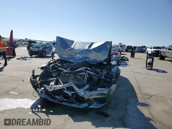 2018 BMW M5 z VIN WBSJF0C50JB282469, wystawiony jako Copart lot #46794335 z przebiegiem Nie podano mil oraz Szkody całkowita. Historia ofert i sprzedaży dostępna na DreamBid. Obrazek 13.