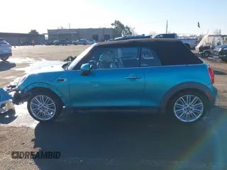 2016 MINI Convertible z VIN WMWWG5C50G3C19656, wystawiony jako IAAI lot #41429611 z przebiegiem 60 873 mil mil oraz . Historia ofert i sprzedaży dostępna na DreamBid. Obrazek 15.