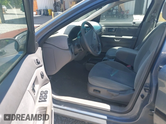 2000 Ford Taurus SE with VIN 1FAFP53U1YG213906, listed as a IAAI auction lot 42064922 with 117,043 mi miles and . Bid and sale history available at DreamBid. Image 5.