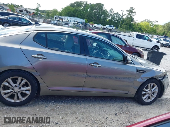 2013 Kia Optima EX z VIN 5XXGN4A73DG246046, wystawiony jako IAAI lot #42196691 z przebiegiem 82 840 mil mil oraz . Historia ofert i sprzedaży dostępna na DreamBid. Obrazek 13.