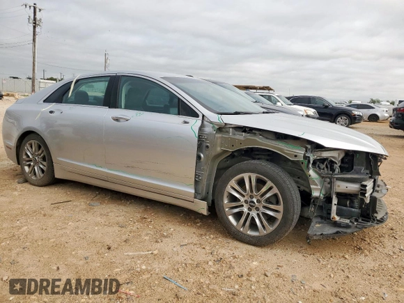2014 Lincoln MKZ z VIN 3LN6L2G90ER815819, wystawiony jako Copart lot #61189515 z przebiegiem 101 148 mil mil oraz Szkoda całkowita • Salvage title. Historia ofert i sprzedaży dostępna na DreamBid. Obrazek 4.