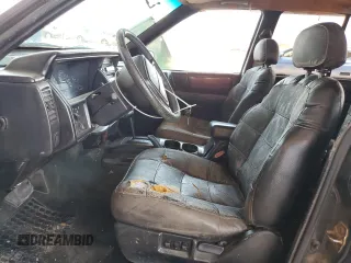 1994 Jeep Grand Cherokee Limited with VIN 1J4GZ78S5RC304501, listed as a Copart auction lot 64632335 with 184,333 mi miles and Salvage title. Bid and sale history available at DreamBid. Image 7.