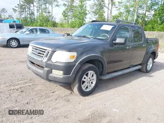 2007 Ford Explorer Sport Trac XLT with VIN 1FMEU31K27UB31618, listed as a IAAI auction lot 42104195 with 110,889 mi miles. Bid and sale history available at carsss.com. Image 2.