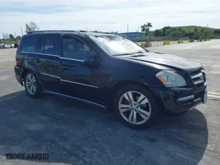 2012 Mercedes-Benz GL-Class GL 450 with VIN 4JGBF7BE1CA797300, listed as a IAAI auction lot 41251227 with 106,896 mi miles. Bid and sale history available at carsss.com. Image 1.