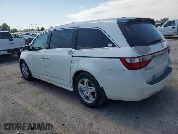 2013 Honda Odyssey Touring with VIN 5FNRL5H99DB052538, listed as a Copart auction lot 66310875 with 192,052 mi miles and Clean title. Bid and sale history available at DreamBid. Image 2.