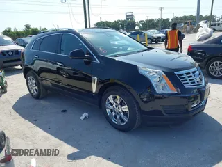 2014 Cadillac SRX Luxury Collection z VIN 3GYFNBE36ES637866, wystawiony jako IAAI lot #42302352 z przebiegiem 63 670 mil mil oraz . Historia ofert i sprzedaży dostępna na DreamBid. Obrazek 1.