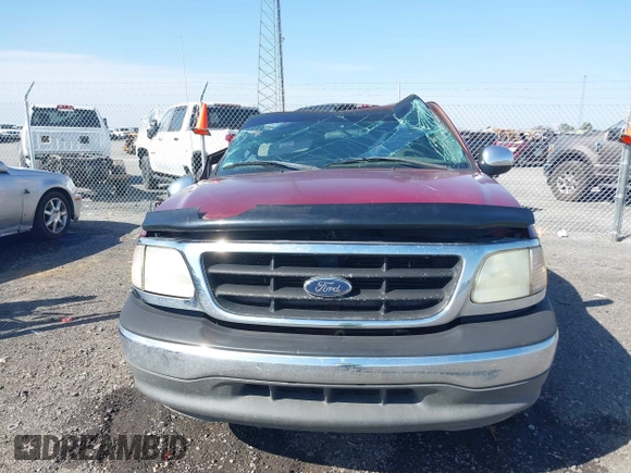 2003 Ford F-150 XL with VIN 1FTRF17W63NA02400, listed as a IAAI auction lot 41752364 with 209,947 mi miles and . Bid and sale history available at DreamBid. Image 12.