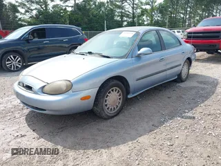 1998 Mercury Sable GS with VIN 1MEFM50U3WG643083, listed as a IAAI auction lot 42481534 with 115,146 mi miles and . Bid and sale history available at DreamBid. Image 2.