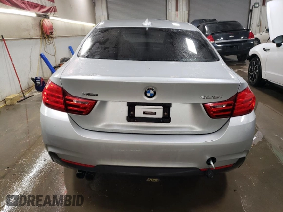 2014 BMW 4 Series 428i xDrive with VIN WBA3N5C50EK196422, listed as a Copart auction lot 82368874 with 68,079 mi miles and Salvage Title. Bid and sale history available at DreamBid. Image 6.