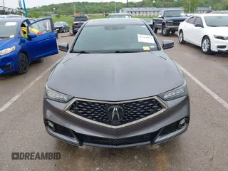 2019 Acura TLX w/A-Spec Pkg z VIN 19UUB2F61KA000932, wystawiony jako IAAI lot #42164064 z przebiegiem 79 080 mil mil oraz . Historia ofert i sprzedaży dostępna na DreamBid. Obrazek 12.
