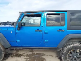 2015 Jeep Wrangler Unlimited Rubicon with VIN 1C4BJWFG5FL558348, listed as a IAAI auction lot 41460025 with 106,012 mi miles. Bid and sale history available at carsss.com. Image 14.