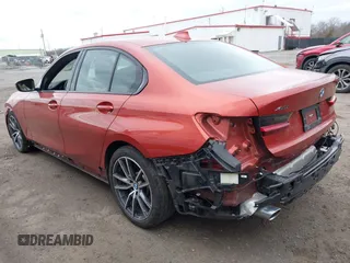 2022 BMW 3 Series 330i xDrive with VIN 3MW5R7J08N8C69862, listed as a IAAI auction lot 41695326 with 56,724 mi miles. Bid and sale history available at carsss.com. Image 3.