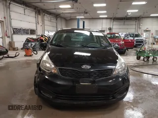 2014 Kia Rio LX with VIN KNADM4A31E6404206, listed as a IAAI auction lot 41543090 with 70,563 mi miles and . Bid and sale history available at DreamBid. Image 12.