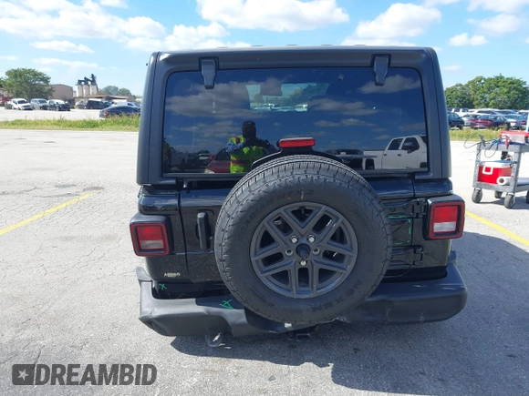 2024 Jeep Wrangler Sport S with VIN 1C4PJXDG7RW325735, listed as a IAAI auction lot 41309348 with 3,577 mi miles and . Bid and sale history available at DreamBid. Image 6.
