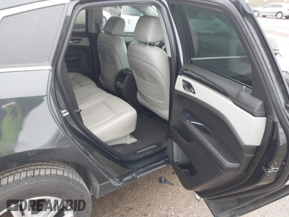 2014 Cadillac SRX Luxury Collection with VIN 3GYFNBE31ES591962, listed as a IAAI auction lot 41948735 with 97,523 mi miles and . Bid and sale history available at carsss.com. Image 8.