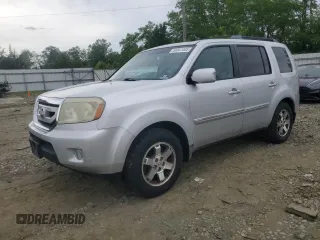 2009 Honda Pilot Touring z VIN 5FNYF48909B012417, wystawiony jako Copart lot #58541445 z przebiegiem 154 387 mil mil oraz Czysty tytuł • Clean title. Historia ofert i sprzedaży dostępna na DreamBid. Obrazek 1.