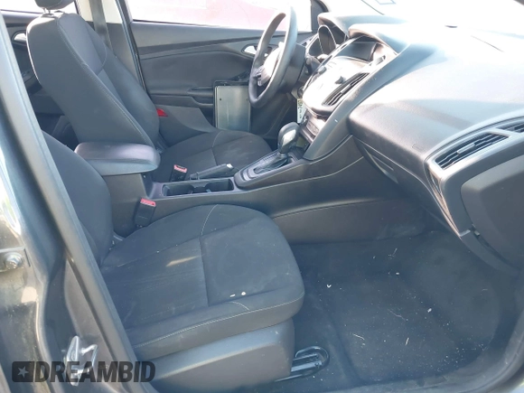 2018 Ford Focus SE with VIN 1FADP3F20JL216525, listed as a IAAI auction lot 41744383 with 92,385 mi miles. Bid and sale history available at carsss.com. Image 5.