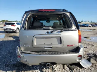 2002 GMC Envoy SLT with VIN 1GKDT13S122491329, listed as a Copart auction lot 75161714 with 149,659 mi miles and Salvage Title. Bid and sale history available at DreamBid. Image 6.
