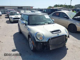 2007 MINI Hardtop S with VIN WMWMF73527TT82098, listed as a IAAI auction lot 41828664 with 107,418 mi miles and . Bid and sale history available at DreamBid. Image 1.