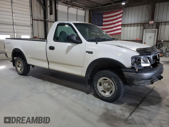 2000 Ford F-150 XL with VIN 1FTZF182XYNC09505, listed as a Copart auction lot 73420184 with 296,202 mi miles and Salvage title. Bid and sale history available at DreamBid. Image 4.