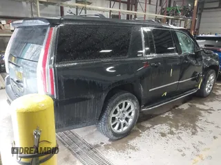 2015 GMC Yukon XL SLT with VIN 1GKS2HKC9FR175011, listed as a IAAI auction lot 41510519 with 194,136 mi miles. Bid and sale history available at carsss.com. Image 4.