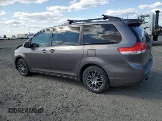 2011 Toyota Sienna XLE with VIN 5TDDK3DC2BS028058, listed as a Copart auction lot 54374215 with 216,905 mi miles and Salvage Title. Bid and sale history available at DreamBid. Image 2.