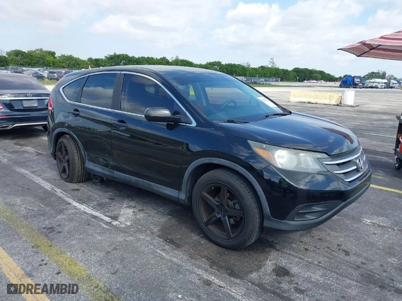 2013 Honda CR-V LX with VIN 3CZRM3H32DG701257, listed as a IAAI auction lot 39174152 with 118,772 mi miles. Bid and sale history available at carsss.com. Image 1.