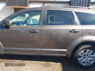 2016 Dodge Journey SE with VIN 3C4PDCAB6GT104588, listed as a IAAI auction lot 41823732 with 133,819 mi miles. Bid and sale history available at carsss.com. Image 14.