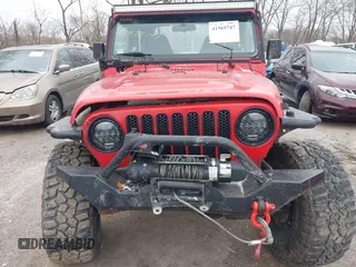 2002 Jeep Wrangler X z VIN 1J4FA39S52P708519, wystawiony jako IAAI lot #41569747 z przebiegiem 219 168 mil mil oraz . Historia ofert i sprzedaży dostępna na DreamBid. Obrazek 6.