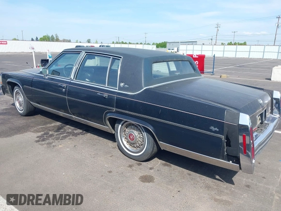 1987 Cadillac Brougham z VIN 1G6DW51Y0H9753376, wystawiony jako IAAI lot #42114437 z przebiegiem 69 484 mil mil oraz . Historia ofert i sprzedaży dostępna na DreamBid. Obrazek 3.