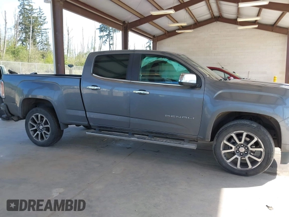 2021 GMC Canyon 4WD Denali with VIN 1GTG6EEN5M1102747, listed as a IAAI auction lot 42121134 with 60,412 mi miles and . Bid and sale history available at DreamBid. Image 13.