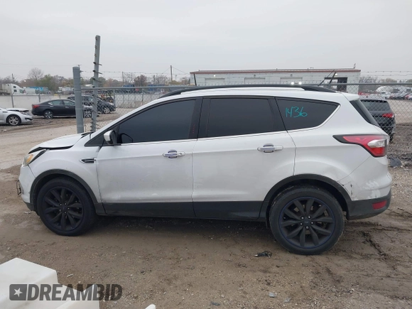 2017 Ford Escape SE with VIN 1FMCU0G94HUA55492, listed as a IAAI auction lot 40881436 with 168,481 mi miles and . Bid and sale history available at carsss.com. Image 14.