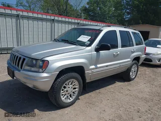 2002 Jeep Grand Cherokee Limited with VIN 1J8GW58S62C253818, listed as a IAAI auction lot 41983592 with 165,378 mi miles. Bid and sale history available at carsss.com. Image 2.