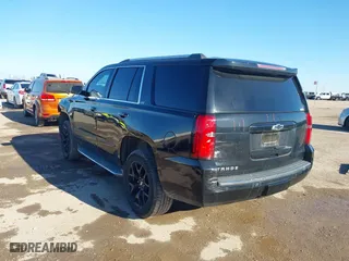 2015 Chevrolet Tahoe LTZ with VIN 1GNSCCKC4FR186632, listed as a IAAI auction lot 41482904 with 149,468 mi miles. Bid and sale history available at carsss.com. Image 3.