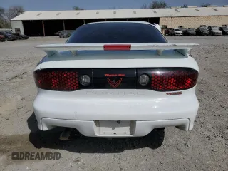 2002 Pontiac Firebird Formula z VIN 2G2FV22G222150957, wystawiony jako Copart lot #48037565 z przebiegiem 112 784 mil mil oraz Szkody całkowita. Historia ofert i sprzedaży dostępna na DreamBid. Obrazek 6.