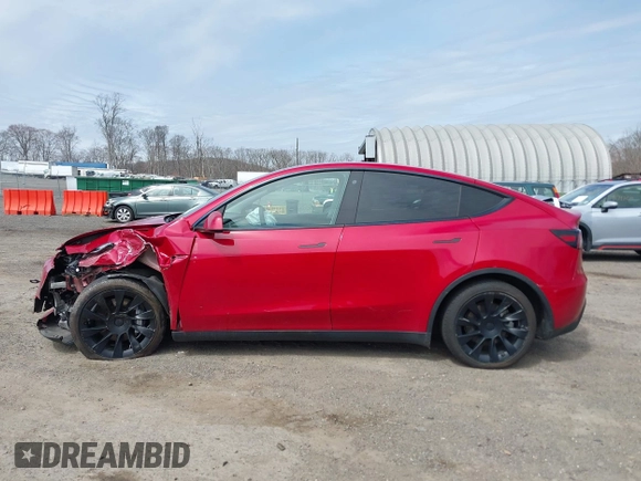 2021 Tesla Model Y Long Range with VIN 5YJYGDEE0MF209191, listed as a IAAI auction lot 41937507 with 56,131 mi miles. Bid and sale history available at carsss.com. Image 13.