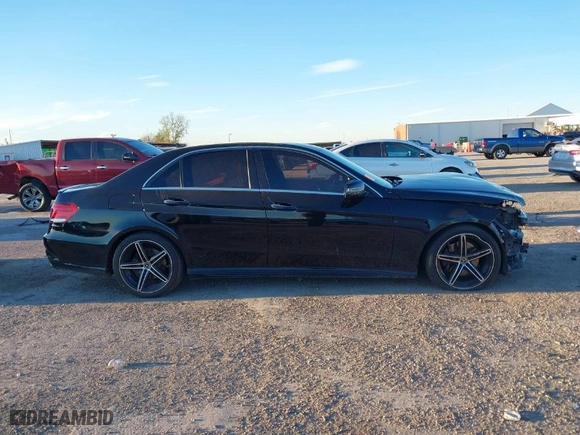 2014 Mercedes-Benz E-Class E 350 Sport with VIN WDDHF5KB2EB038828, listed as a IAAI auction lot 41238332 with 180,580 mi miles. Bid and sale history available at carsss.com. Image 14.